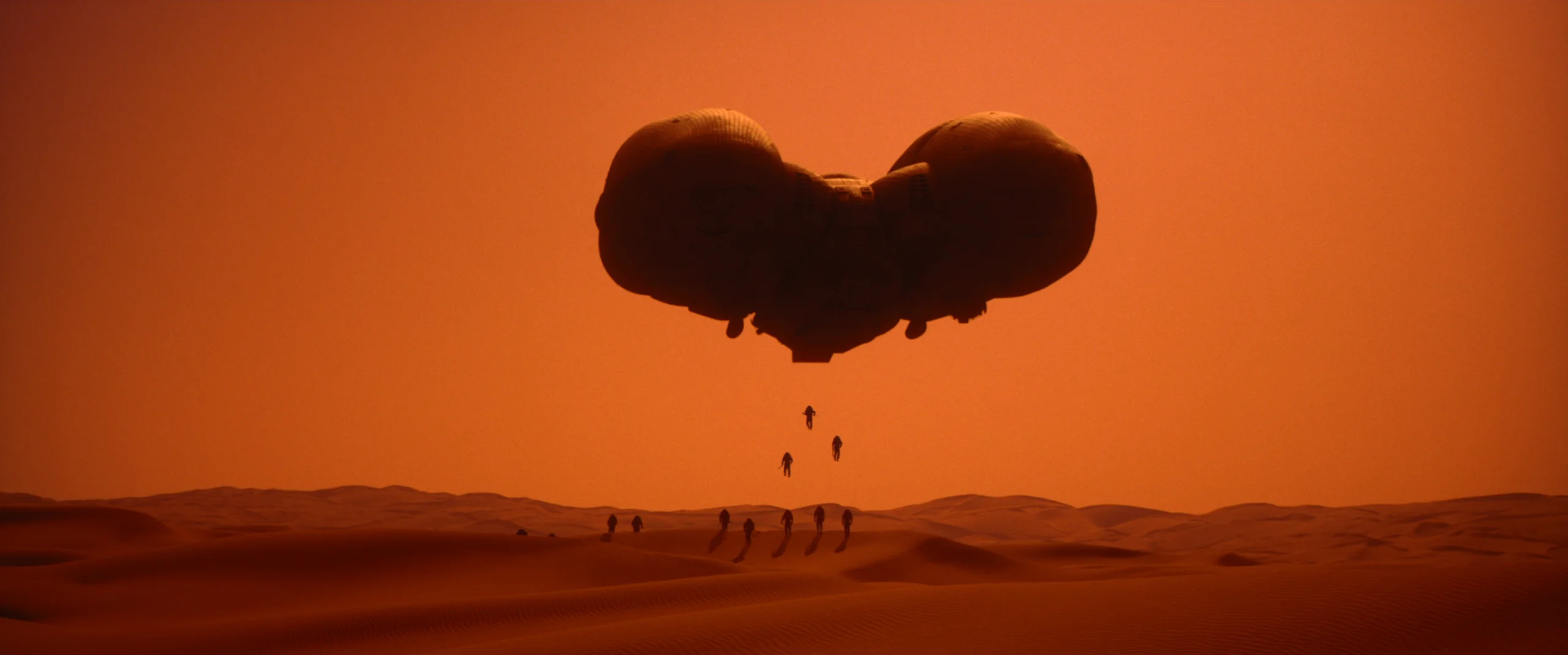 Dune: Part Two, carrier ship over orange dunes