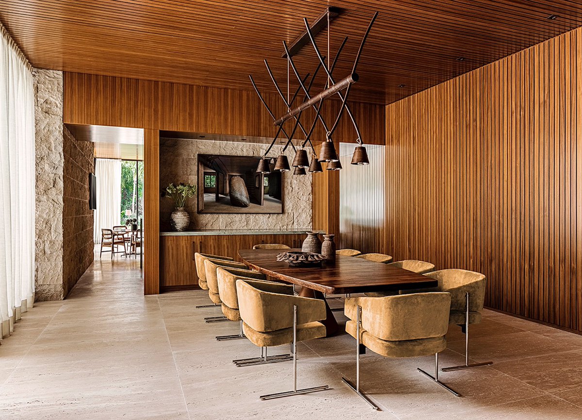 Wood-lined dining room, live-edge table