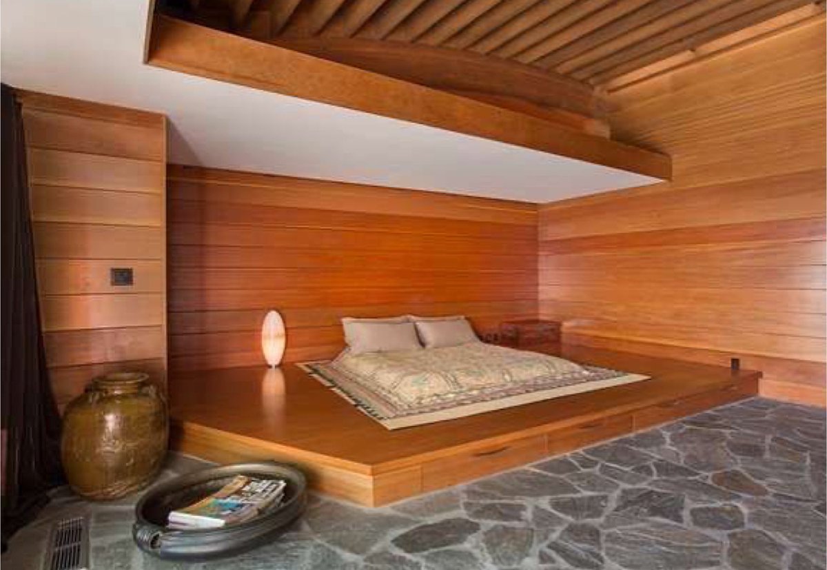 Cedar-clad bedroom on a raised platform