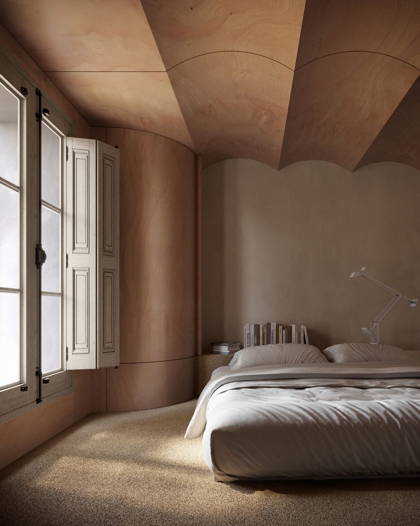 Curved plaster bedroom, warm light