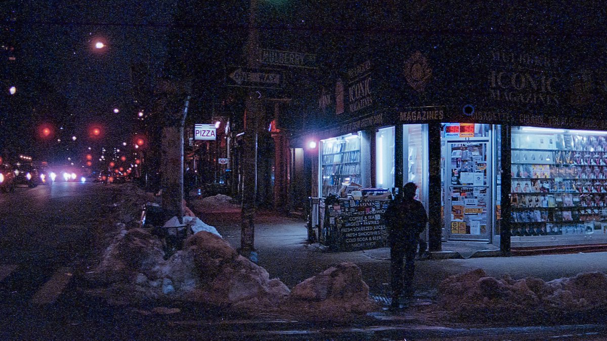 Newsstand corner, snowy night