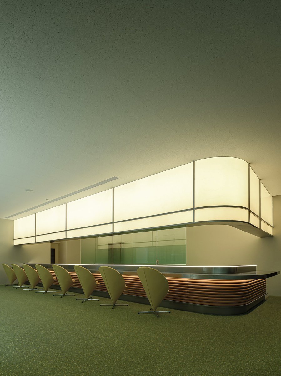 Green lounge with cone chairs