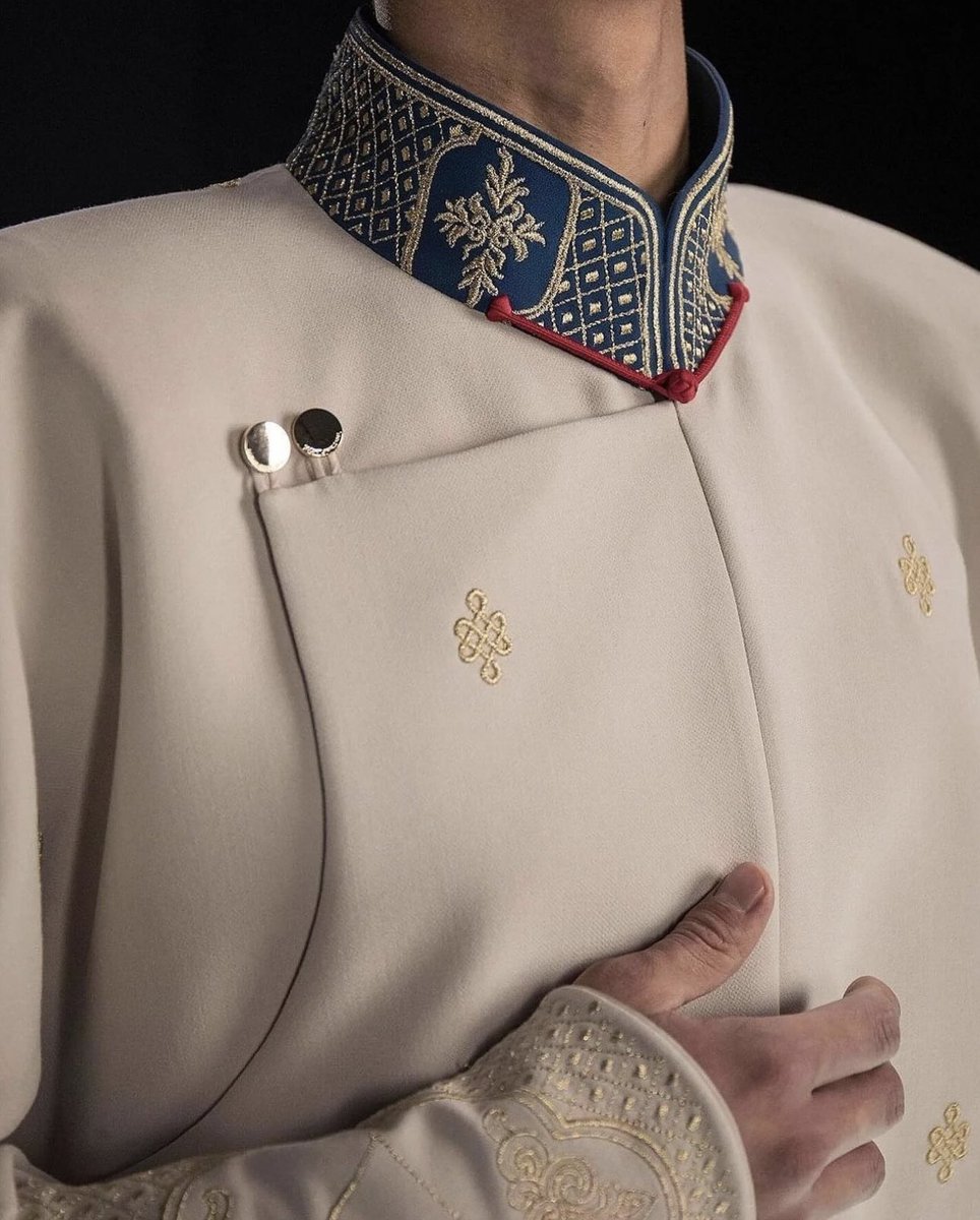 Embroidered mandarin-collar coat, detail