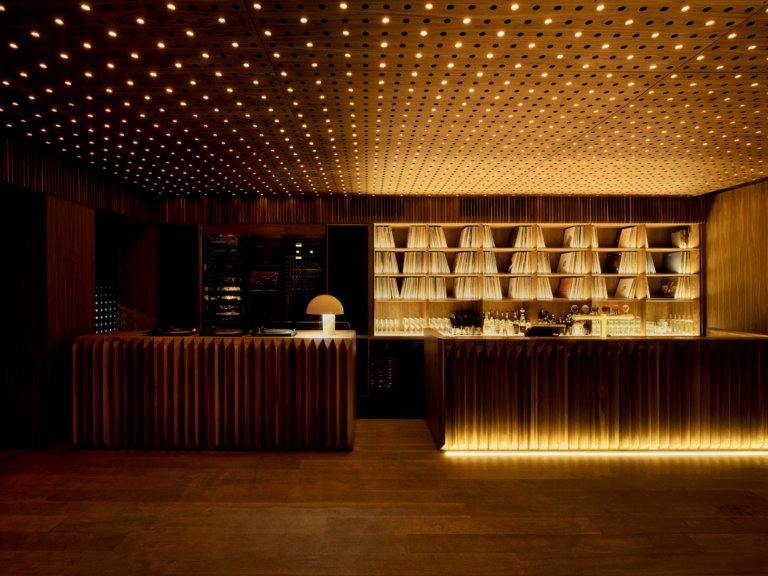 Perforated ceiling wine bar