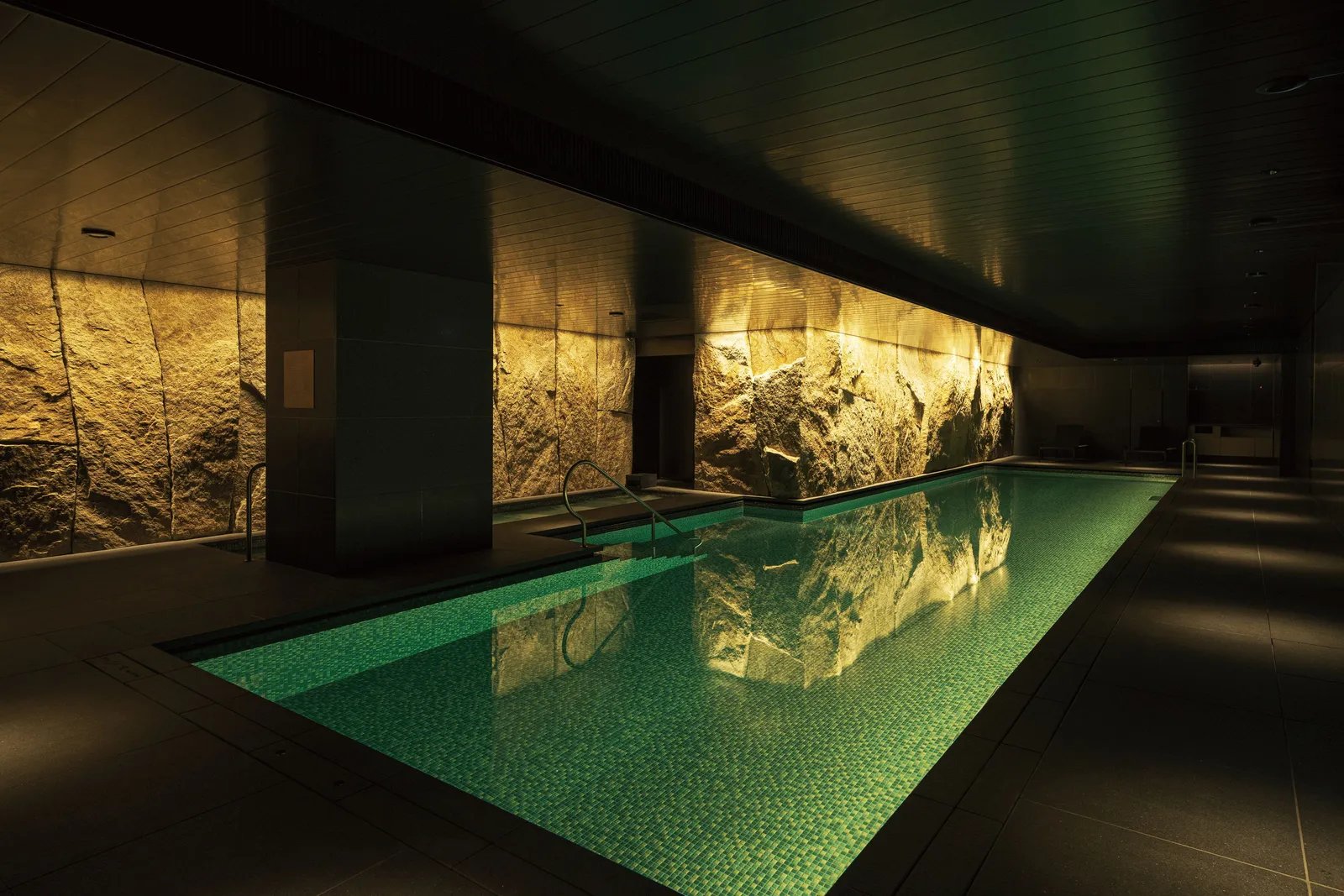 Underground pool, stone wall