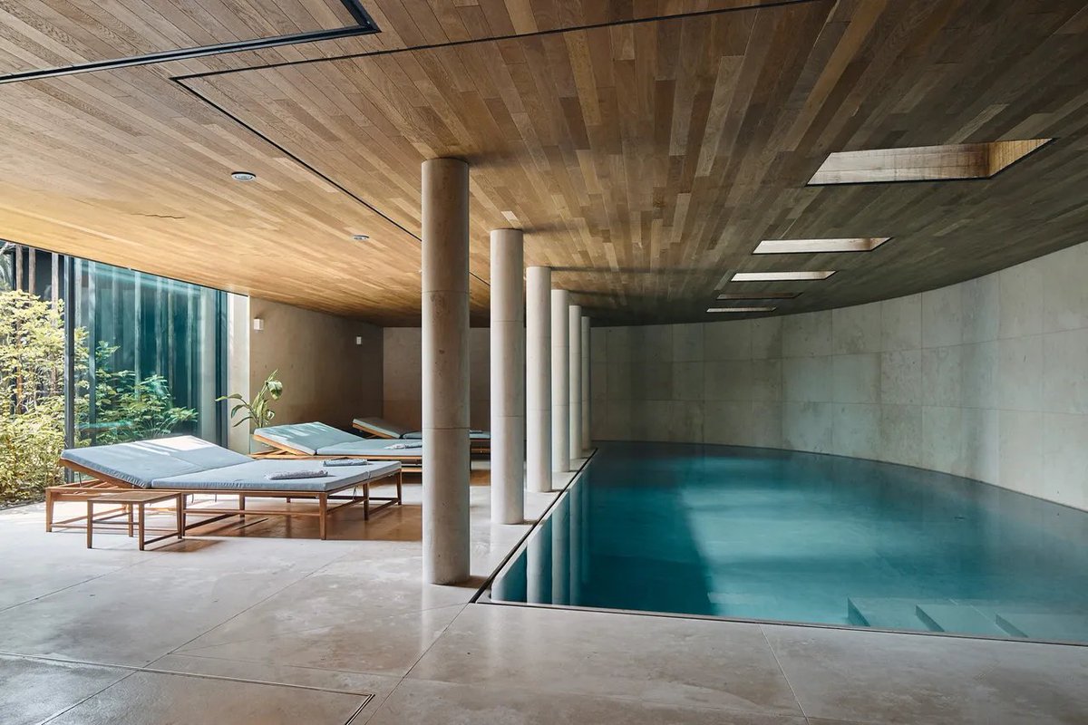 Sunken pool, curved timber ceiling