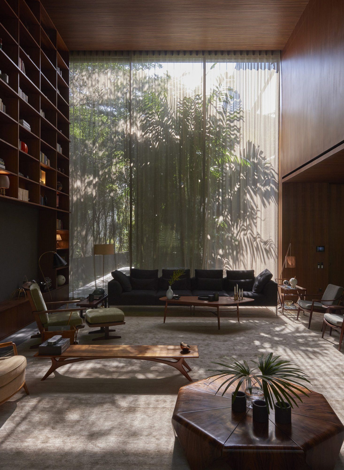 Double-height living room, sheer curtains