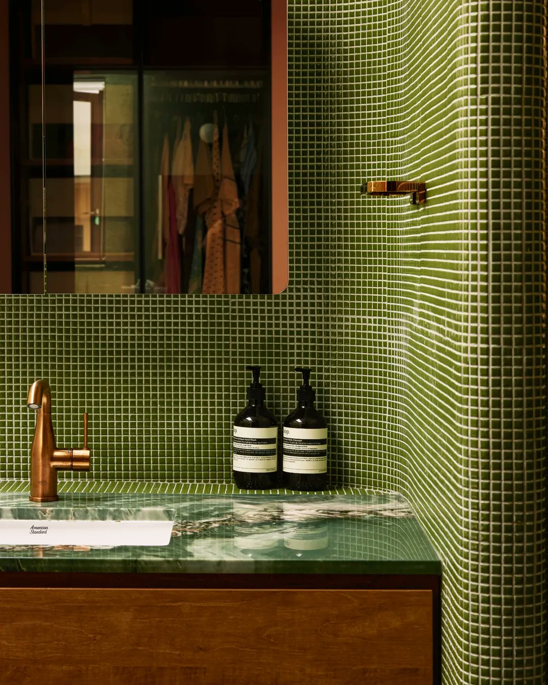 Green mosaic bathroom, copper fittings