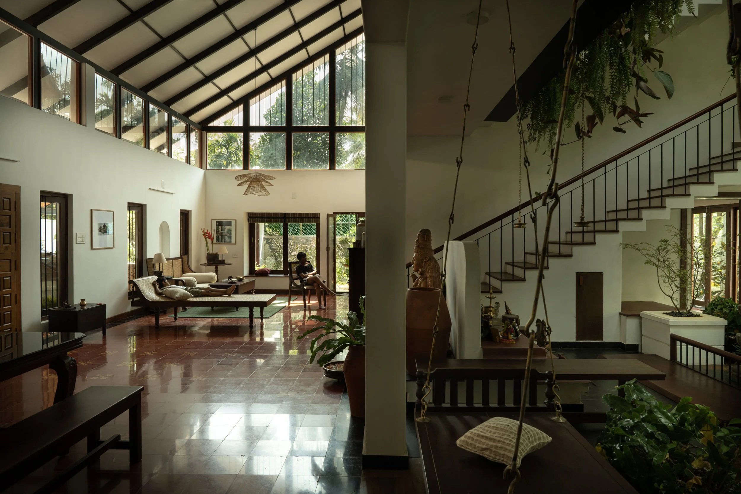 Double-height tropical living hall