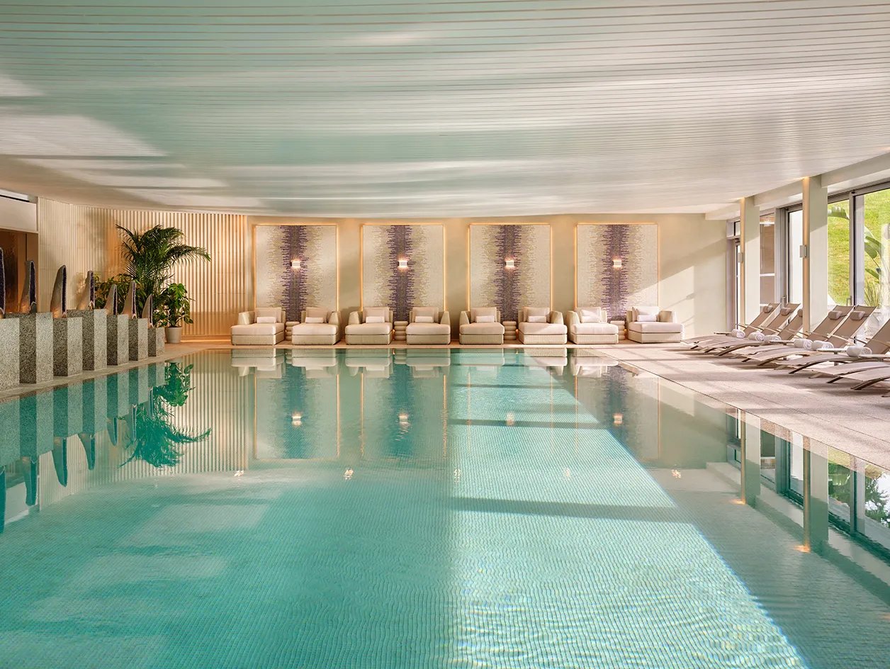 Indoor spa pool in soft cream tones