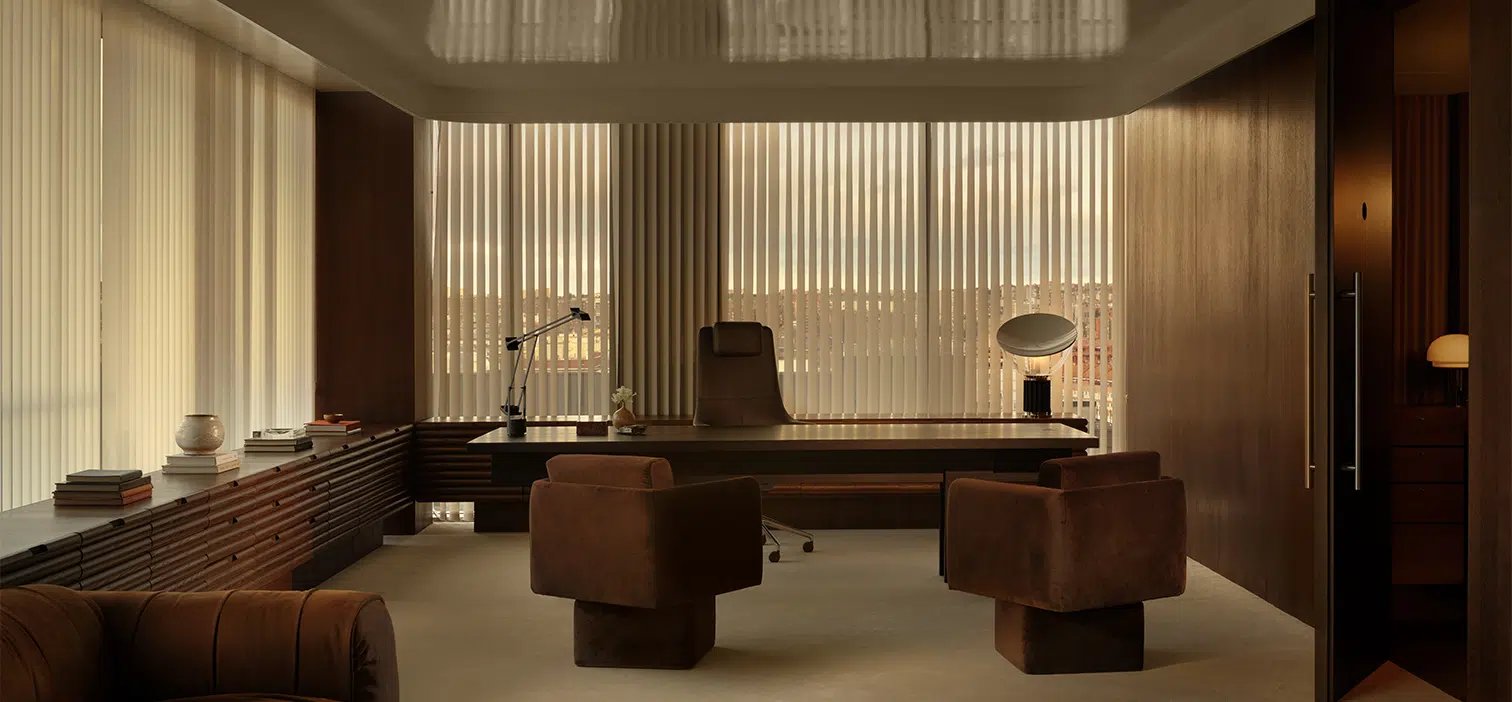 Wood-panelled executive office at dusk