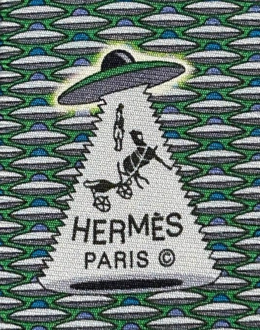 Hermès silk label with UFO abduction motif