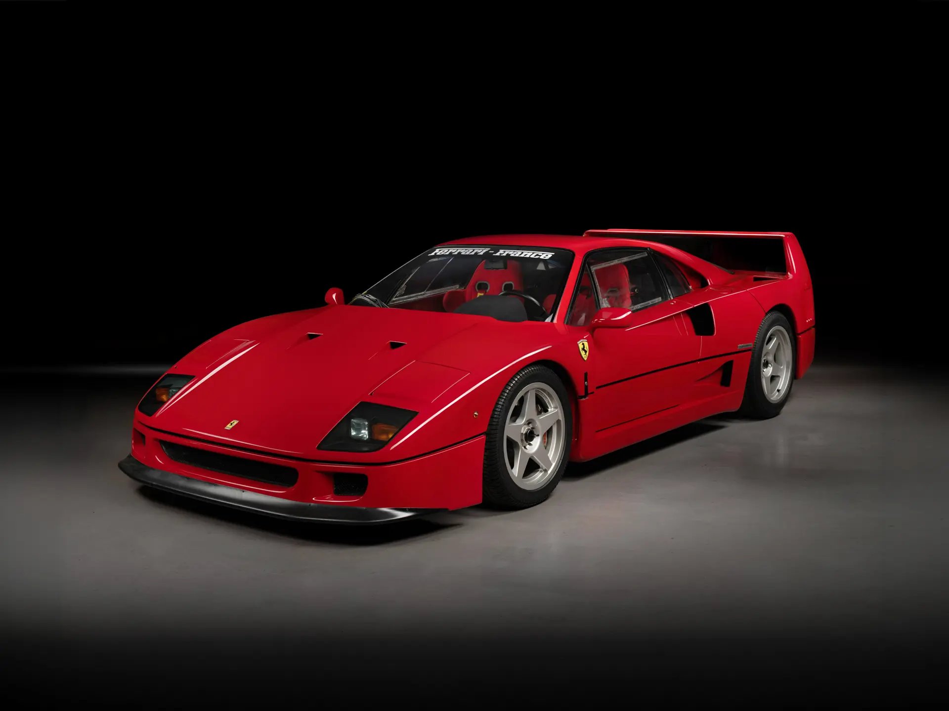 Ferrari F40 in a black studio