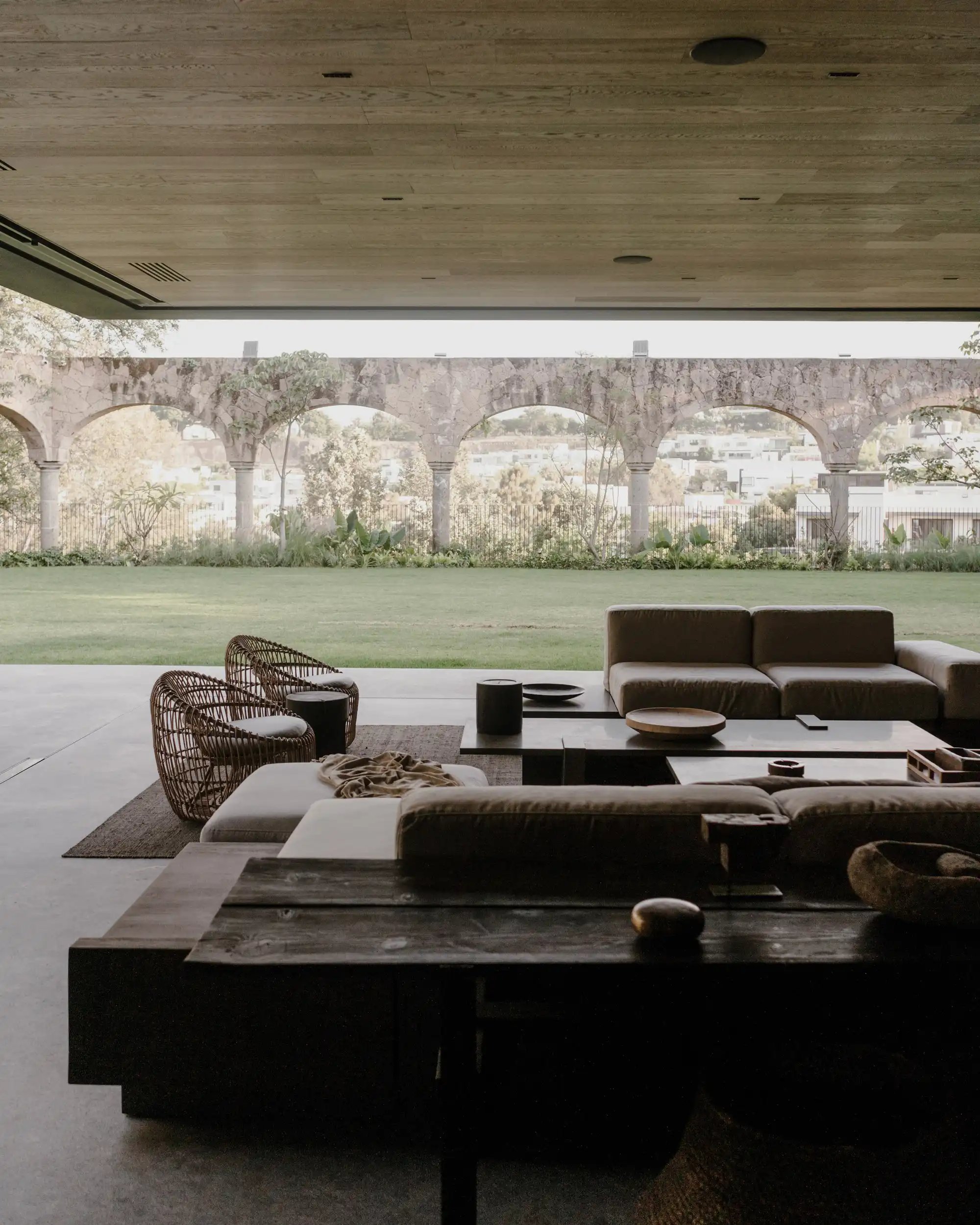 Open terrace lounge facing aqueduct arches