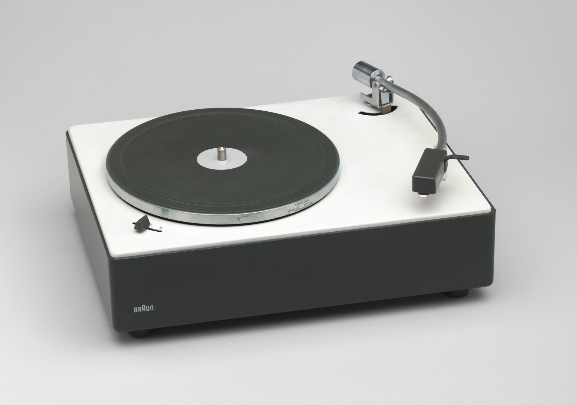 Braun turntable, white deck and curved tonearm
